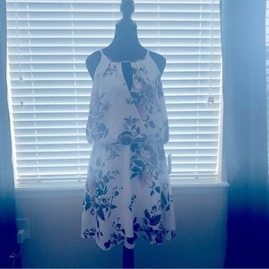 White flower patterned dress.